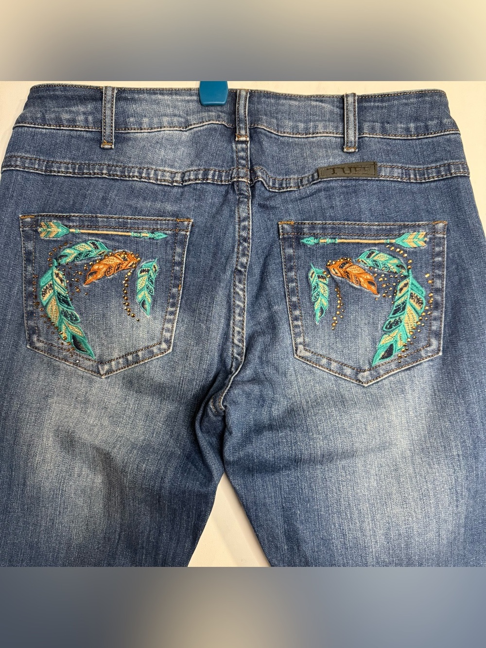 Cowgirl Tuff Blue Jeans with Turquoise & Orange Embroidered Pockets